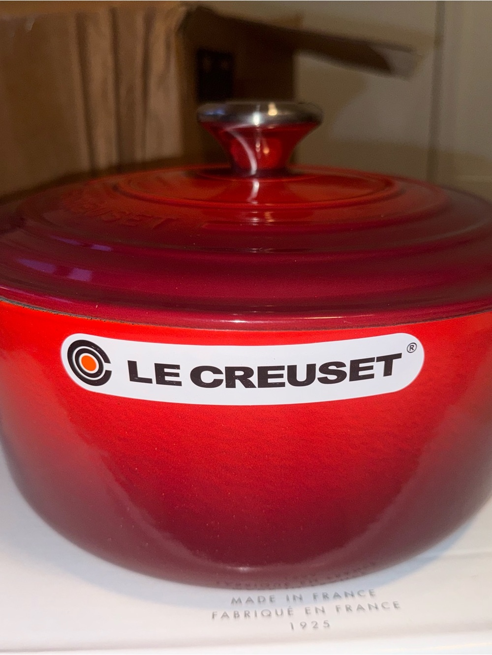 Le Creuset Bright Red Enamel Round Dutch Oven with Silver Knob